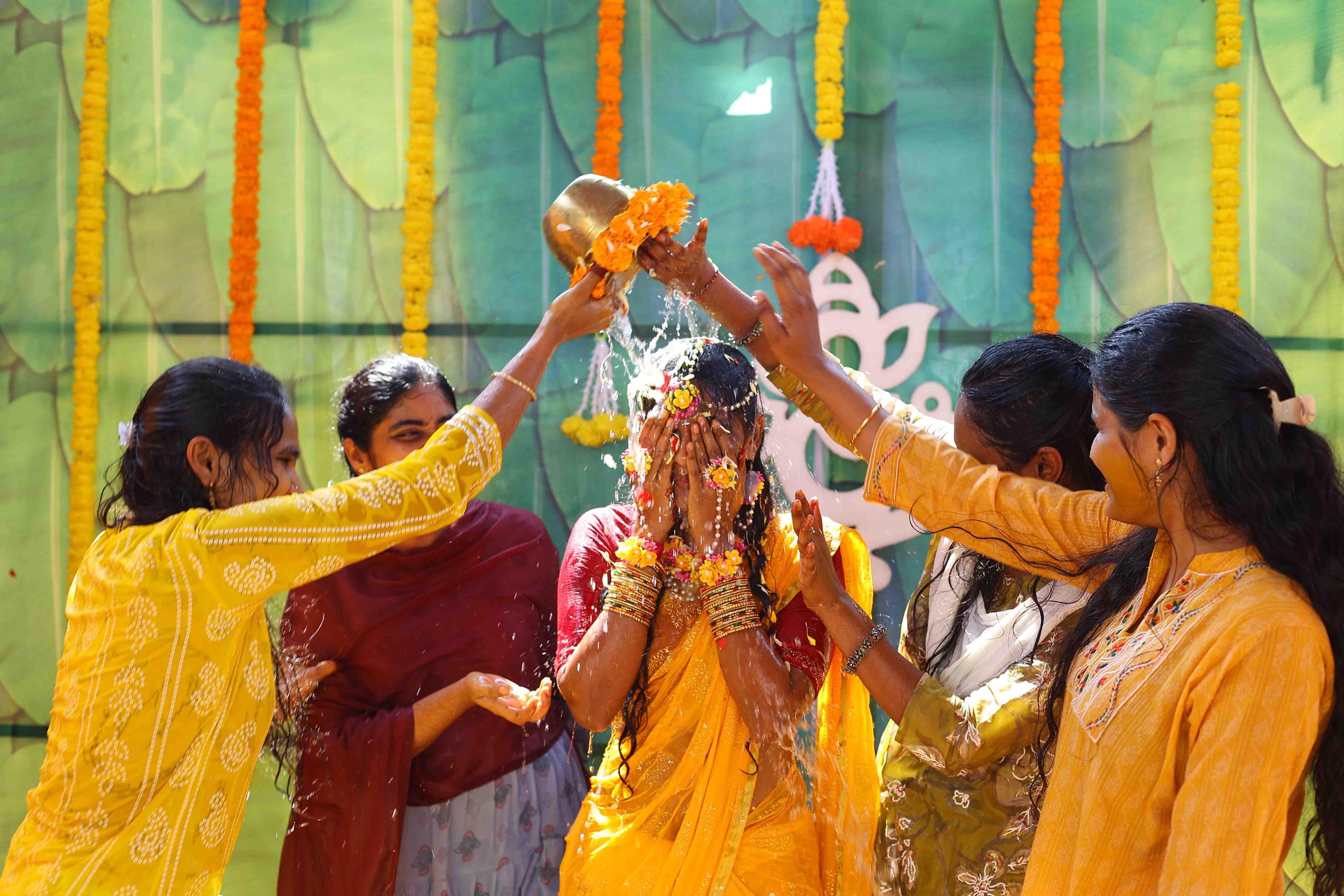 Eswari enjoying haldi rituals surrounded by her loving cousins