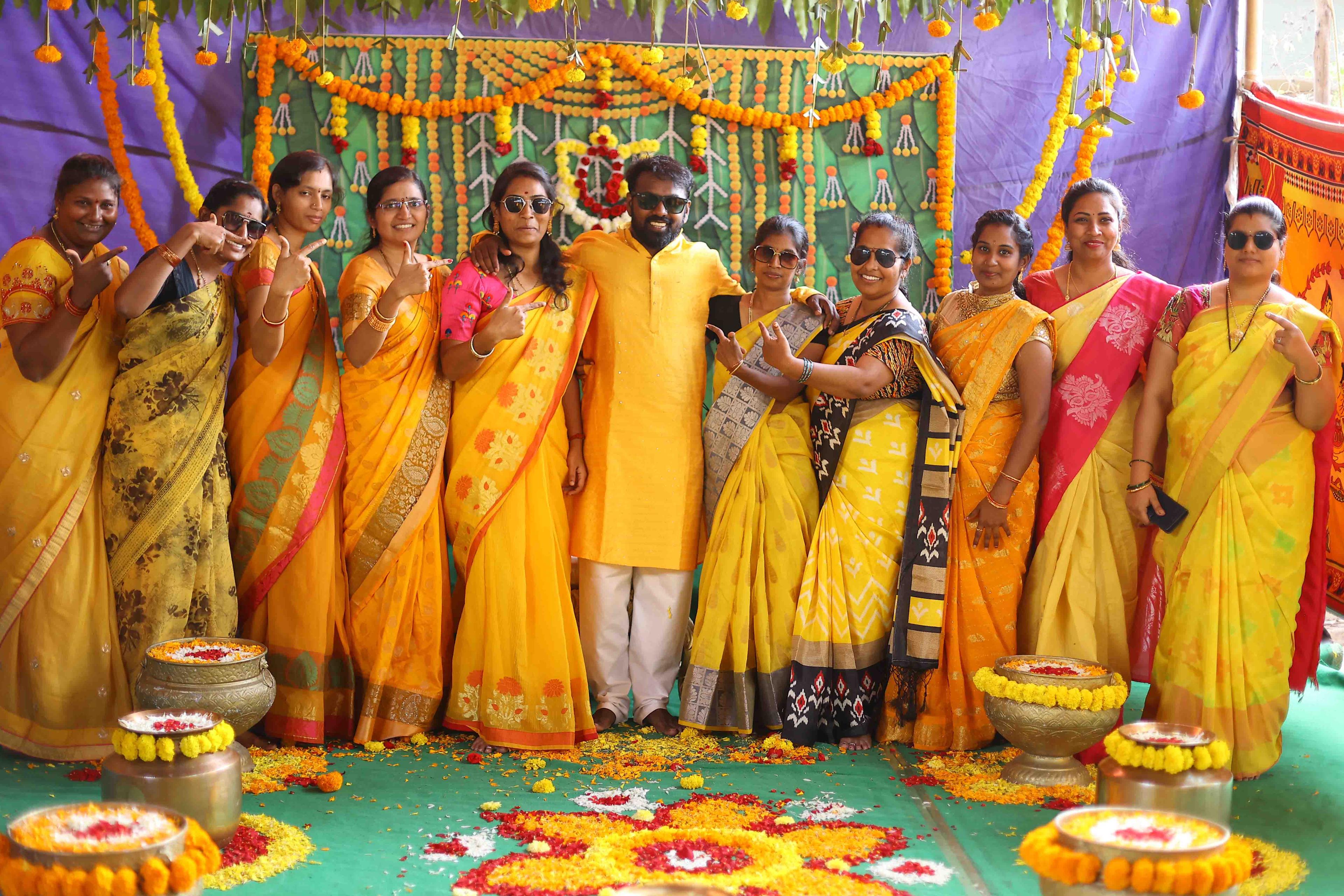 Joyful family picture of Anil with his cousins at haldi
